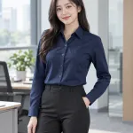 Áo sơ mi đồng phục màu xanh navy, túi ngực gọn, form tay dài cổ đức, chất kate silk