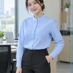 Áo sơ mi đồng phục màu xanh dương nhạt, túi ngực gọn, form cổ tàu hiện đại, chất kate ford
