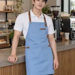 Tạp dề đồng phục màu xanh dương nhạt, phối da nhân tạo, form yếm cúc điều chỉnh, chất kaki thun