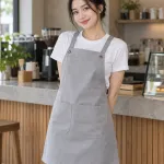 Tạp dề đồng phục màu ghi sáng, túi đôi phía trước, form dây đeo chữ X, chất kaki cotton