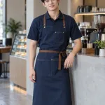 Đồng phục quán cafe màu xanh navy, phối tạp dề dài, form combo áo và tạp dề, chất kaki cotton