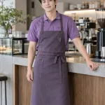 Đồng phục quán cafe màu tím khói, phối tạp dề dài, form áo thun phục vụ, chất canvas mềm