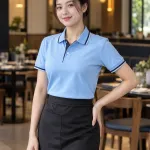 Đồng phục nhà hàng màu xanh dương nhạt, phối nẹp cổ, form polo vận hành, chất cotton poly