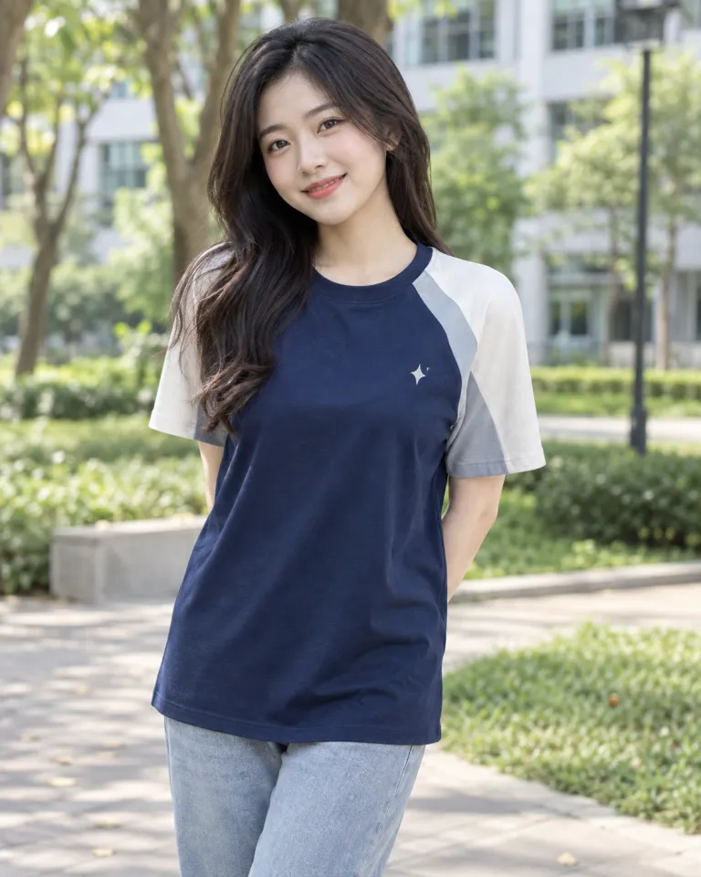 Người mẫu Việt Nam mặc áo nhóm màu xanh navy, phối tay hai màu, form tay raglan, chất cotton poly